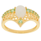 Pear white opal sterling silver ring with accents of sparkling gemstones in elegant gold design.